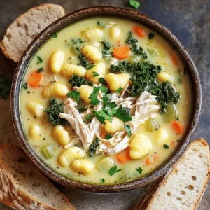 - 1 lb boneless, skinless chicken breasts - 4 cups chicken broth - 2 cups kale, chopped into bite-sized pieces - 1 cup carrots, diced into small cubes - 1 cup celery, diced finely - 1 cup potatoes, peeled and diced - 1 teaspoon dried thyme - 1 teaspoon garlic powder - 1 teaspoon onion powder - 1 teaspoon Italian seasoning - 1 cup heavy cream - 12 oz gnocchi (store-bought or homemade) - Salt and freshly ground black pepper to taste - Fresh parsley, chopped for garnish When I make this soup, I start with fresh, high-quality ingredients. The chicken is the star of the show. I always choose boneless, skinless breasts for their ease of use. They cook up tender and soak up all the flavors. Next, I pack in the veggies. Kale adds a great texture. Carrots, celery, and potatoes give it a lovely depth. These vegetables not only taste great but also make the soup hearty. Seasoning is key to this dish. I use dried thyme, garlic powder, onion powder, and Italian seasoning to give it that warm, comforting flavor. The cream and gnocchi come in at the end. The cream makes the broth rich and smooth. The gnocchi adds a fun twist; they are soft and pillowy. Each ingredient plays a part in making the soup cozy and satisfying. This simple recipe is a joy to share, and I love how it brings everyone together. To start, place the boneless chicken breasts in the slow cooker. Spread them out evenly so they cook well. Next, pour the chicken broth over the chicken. Make sure it covers the chicken completely for the best flavor. After that, add the chopped kale, diced carrots, diced celery, and diced potatoes. Distribute these veggies evenly throughout the broth. Now, sprinkle the dried thyme, garlic powder, onion powder, and Italian seasoning over the ingredients. These spices add a lovely flavor to the soup. Gently stir the mixture to combine all the flavors. Be careful not to disturb the chicken too much while stirring. Cover the slow cooker with its lid. Set it to low heat and let it cook for 6 to 7 hours. If you’re in a hurry, you can set it on high for 3 to 4 hours. The chicken should be fully cooked, and the vegetables should be tender. Once the cooking time is up, use tongs to carefully remove the chicken from the slow cooker. Shred the chicken using two forks to break it into bite-sized pieces. Return the shredded chicken to the soup. Now, stir in the heavy cream and the gnocchi. Mix gently to incorporate them into the soup. Cook on high for an additional 30 minutes, or until the gnocchi is tender and plump. Before serving, taste the soup. Adjust the seasoning with salt and freshly ground black pepper to your liking. To make your soup even better, try adjusting the seasonings. You can add a bit more garlic powder for a stronger taste. If you want a fresh twist, consider adding lemon juice. Fresh herbs like basil or oregano can also boost the flavor. These herbs lend a nice aroma and depth to the dish. To ensure perfect gnocchi, avoid cooking them too long. Add them in the last 30 minutes of cooking. This keeps them tender without turning mushy. For vegetables, add sturdy ones like carrots and potatoes first. They hold up better during long cooking times. Add softer vegetables like kale later to keep them vibrant and crisp. When serving, ladle the soup into deep bowls. Sprinkle freshly chopped parsley on top for color and freshness. You can also serve the soup with crusty bread on the side. This bread is perfect for dipping into the rich broth. Consider using a nice loaf or dinner rolls for added texture. {{image_4}} For those needing gluten-free options, many brands offer gluten-free gnocchi made from potato or rice flour. These work well in this soup. If you're dairy-free, swap heavy cream with coconut milk or a nut-based cream. Both options add creaminess without the dairy. You can use seasonal veggies to change up the soup. Try adding zucchini or spinach for extra flavor and nutrition. If you want more protein, consider adding legumes like white beans or lentils. They blend well and make the soup heartier. If you like heat, add crushed red pepper flakes or cayenne pepper. Start with a small amount and adjust to your taste. For a spicy kick, serve the soup with hot sauce on the side. This way, everyone can add the heat they like. To store your leftover Slow Cooker Chicken Gnocchi Soup, cool it down first. Pour the soup into a large bowl and let it sit for about 30 minutes. Once cool, transfer it to an airtight container. Make sure to seal it well to keep out air. In the fridge, your soup will last for about 3 to 4 days. Always check for any off smells before eating leftovers. If it smells okay, heat it up on the stove or in the microwave. If you want to store the soup for longer, freezing is a great option. To freeze, let the soup cool completely. Use freezer-safe containers or heavy-duty freezer bags. Leave some space at the top of the container for the soup to expand. Label the containers with the date. Your soup can last in the freezer for up to 3 months. When you are ready to eat it, thaw it overnight in the fridge. Reheat it on the stove or in the microwave until it is hot. Yes, you can use frozen chicken in this soup. If the chicken is frozen, you need to adjust the cooking time. Cook the soup on high for 4 to 5 hours instead of 3 to 4 hours. This extra time ensures the chicken cooks thoroughly and stays juicy. To make this soup vegetarian, you can substitute the chicken with plant-based protein. Use beans or lentils for a hearty texture. Replace the chicken broth with vegetable broth to keep the flavor rich. You can also add more vegetables like mushrooms or zucchini for extra nutrients. Yes, fresh gnocchi works great in this soup! If you use fresh gnocchi, reduce the cooking time. Add the fresh gnocchi in the last 15 to 20 minutes of cooking. This helps them cook perfectly without getting too soft. You can make a fun and tasty soup using simple steps. We explored key ingredients like chicken, vegetables, and creamy gnocchi. I shared tips for flavor, texture, and presentation. You can adapt this soup to fit your diet or spice preferences, too. Finally, I covered how to store leftovers well. Enjoy this easy recipe, and get creative with your own twists!