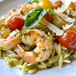 - 1 cup orzo pasta - 1 lb shrimp, peeled and deveined - 1 cup basil pesto (store-bought or homemade) - 1 cup cherry tomatoes, halved - 2 cloves garlic, minced - 2 tablespoons olive oil - 1/2 teaspoon red pepper flakes (optional) - Salt and pepper to taste - 2 tablespoons grated Parmesan cheese (optional) - Fresh basil leaves for garnish - Additional herbs (like parsley or oregano) - Lemon zest for added freshness - Spinach or other leafy greens for extra nutrition This dish uses simple yet rich ingredients to create amazing flavor. Orzo pasta offers a nice texture that pairs well with shrimp. The basil pesto adds a fresh, herbal note. Cherry tomatoes bring sweetness and color to the plate. Garlic adds depth, while olive oil keeps everything moist. You can add red pepper flakes for a little heat. Salt and pepper enhance all the flavors. For a touch of creaminess, sprinkle Parmesan cheese on top. Fresh basil leaves make a great garnish and add more aroma. I love using optional ingredients to tweak the dish to my taste. Adding lemon zest brightens flavors. You can also mix in leafy greens for a healthy boost. Feel free to play with herbs and create your own twist! {{ingredient_image_2}} - Bring a large pot of salted water to a boil. - Add 1 cup of orzo pasta. - Cook until it is al dente, about 8-10 minutes. - Drain the orzo in a colander and set it aside. - Heat 2 tablespoons of olive oil in a skillet over medium heat. - Add 2 cloves of minced garlic to the oil and sauté for about 30 seconds. - Stir in 1 pound of peeled and deveined shrimp. - Season the shrimp with salt, pepper, and 1/2 teaspoon of optional red pepper flakes. - Let the shrimp cook for 2-3 minutes without stirring. - Flip the shrimp and cook for another 2-3 minutes until they are pink and opaque. - Carefully add the drained orzo to the skillet. - Add 1 cup of halved cherry tomatoes and 1 cup of basil pesto. - Gently toss all the ingredients together for about 2 minutes. - Make sure everything is evenly coated with the pesto and heated through. - Remove the skillet from the heat. - If you like, sprinkle with 2 tablespoons of grated Parmesan cheese. - Garnish with fresh basil leaves for a beautiful finish. - How to avoid overcooking shrimp: Cook shrimp for just 2-3 minutes on each side. They should be pink and opaque. If you leave them too long, they can become tough. - Recommended cooking times for perfect orzo: Boil orzo for about 8-10 minutes until al dente. Check the package for exact times. Drain it well to avoid sogginess. - Suggestions for adjusting flavors with spices: Add red pepper flakes for heat or fresh herbs for brightness. You can also stir in lemon juice for freshness. - Pairing with side dishes: Serve with a fresh salad or warm bread. A simple arugula salad with lemon dressing adds a nice touch. - Ideal wine pairings for this dish: A crisp white wine, like Sauvignon Blanc, goes well with shrimp. A light rosé can also be a fun choice. - Adjusting spice levels for children: Omit red pepper flakes if your kids prefer milder flavors. You can add them later for adults. - Adding vegetables for nutrition: Toss in some spinach or zucchini. They add vitamins and color without changing the dish's taste much. Pro Tips Fresh Pesto is Best: If possible, use homemade basil pesto for a fresher flavor. You can make it quickly by blending fresh basil, garlic, pine nuts, Parmesan cheese, and olive oil. Perfectly Cooked Shrimp: To avoid overcooking, remove the shrimp from the heat as soon as they turn pink and opaque. They will continue to cook slightly from residual heat. Customize Your Veggies: Feel free to add other vegetables like spinach, zucchini, or bell peppers for extra nutrients and color. Just sauté them along with the garlic before adding the shrimp. Serving Suggestions: Pair this dish with a crisp side salad or garlic bread to complement the flavors and create a complete meal. {{image_4}} You can switch up the shrimp for chicken or scallops. Chicken offers a mild flavor and works well with pesto. Just cook it until it's safe to eat. If you choose scallops, they cook fast. Sear them in the pan for a couple of minutes on each side. Both options give you a tasty twist. If you want a vegetarian dish, consider using chickpeas. They add protein and fiber. Simply rinse canned chickpeas and toss them in with the other ingredients. This change keeps the dish hearty and satisfying. Making homemade pesto is simple and fun. You need fresh basil, garlic, nuts, olive oil, and cheese. Blend them until smooth. The taste is fresh and bright. It adds a personal touch to your meal. You can also try different types of pesto. Sun-dried tomato pesto brings a rich flavor. Arugula pesto offers a peppery kick. Both alternatives add unique tastes to your Pesto Shrimp Orzo. Want to amp up the flavor? Consider adding capers or olives. Capers give a briny, tangy taste. Olives add depth and richness. Just chop them up and mix them in. Incorporating different vegetables can enhance your dish, too. Zucchini or bell peppers add color and nutrition. Sauté them with the shrimp for extra texture and flavor. Mixing in veggies keeps the dish fresh and exciting. To store your leftover Pesto Shrimp Orzo, use an airtight container. Glass containers work well and help keep food fresh. This dish lasts up to three days in the fridge. Make sure it cools before sealing to avoid moisture build-up. To reheat without losing quality, use the stovetop. Heat a skillet over low heat and add a splash of olive oil. Stir in the orzo mixture gently until warm. You can also add a bit of pesto or olive oil to refresh the flavors. Microwaving is quick, but it may dry out the dish. Yes, you can freeze Pesto Shrimp Orzo. Use freezer-safe containers to avoid freezer burn. It will keep for about three months. When ready to eat, thaw it in the fridge overnight. Reheat on the stovetop with a splash of water or broth for moisture. Orzo is a type of pasta that looks like rice. It is small and oval-shaped. You can use orzo in soups, salads, or as a side dish. It cooks quickly and pairs well with many flavors. Yes, you can prep this dish in advance. Cook the orzo and shrimp but do not mix them with the pesto yet. Store each part in separate containers. When ready to eat, just combine everything in a pan to heat through. This keeps the flavors fresh. To make basil pesto, gather these ingredients: - 2 cups fresh basil leaves - 1/2 cup olive oil - 1/3 cup pine nuts - 2 cloves garlic - 1/2 cup Parmesan cheese - Salt to taste Blend the basil, pine nuts, and garlic in a food processor. Slowly add the olive oil while blending. Finally, mix in the cheese and salt. This creates a fresh, flavorful pesto. Orzo is made from wheat, so it is not gluten-free. For gluten-sensitive individuals, use gluten-free pasta. Many brands offer gluten-free orzo made from rice or quinoa. This dish pairs well with several sides. Consider a fresh salad with greens and a light vinaigrette. Garlic bread also complements the meal nicely. For something warm, try roasted vegetables or a side of steamed asparagus. This blog post shared a simple recipe for Pesto Shrimp Orzo. We covered required and optional ingredients, cooking steps, and helpful tips. You can adjust this dish to fit your taste or dietary needs. Remember, you can swap shrimp for other proteins or add veggies for more nutrients. Enjoy experimenting and making it your own!
