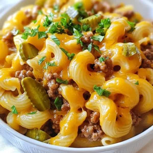 - 8 oz elbow macaroni - 1 lb ground beef - 1 small onion, diced - 2 cloves garlic, minced - 1 cup beef broth - 1 cup milk - 1 cup shredded cheddar cheese - 1 teaspoon Worcestershire sauce - 1 teaspoon mustard - Salt and pepper to taste These main ingredients form the base of the dish. The elbow macaroni adds a nice bite. Ground beef gives a hearty flavor. Diced onion and minced garlic enhance the taste. Beef broth and milk create a creamy sauce. Worcestershire sauce and mustard bring depth. - 1/2 cup diced tomatoes (optional, for added freshness) - Chopped pickles (for garnish) - Fresh parsley, chopped (for garnish) You can add diced tomatoes for a fresh touch. Pickles add a nice crunch. Fresh parsley brightens the dish. These add-ins make each bite more exciting. - Large pot - Spatula - Measuring cups and spoons - Knife and cutting board Having the right tools makes cooking easier. A large pot lets you cook everything in one place. A spatula helps you stir and break up the beef. Measuring cups and spoons ensure you add the right amounts. A knife and cutting board are key for prep work. {{ingredient_image_2}} First, take a large pot and set it over medium heat. Add 1 pound of ground beef. Use a spatula to break it apart as it cooks. Stir until the meat is brown and no longer pink. This should take about 5-7 minutes. Drain any excess fat to keep your dish light and tasty. Next, add 1 small diced onion and 2 cloves of minced garlic to the pot. Stir and cook for about 3-4 minutes. You want the onion to turn soft and clear. This step adds great flavor to your dish. Now, pour in 1 cup of beef broth and 1 cup of milk. Add 1 teaspoon of Worcestershire sauce and 1 teaspoon of mustard. Stir it gently and bring it to a light simmer. This will blend all the flavors well. Then, add 8 ounces of elbow macaroni. Make sure the pasta is well-coated in the liquid. Cover the pot with a lid. Cook for about 10-12 minutes. Stir every few minutes to stop the pasta from sticking. The pasta should be al dente and most of the liquid should be absorbed. Once the pasta is done, remove the pot from heat. Stir in 1 cup of shredded cheddar cheese. This will melt into a creamy sauce. If you want, add 1/2 cup of diced tomatoes for extra freshness. Taste your dish and add salt and pepper to your liking. Serve your One-Pot Cheeseburger Pasta in deep bowls. For a fun touch, garnish with chopped pickles and fresh parsley. Enjoy your delicious meal! To cook your pasta just right, start with enough water. Add a pinch of salt to the water before boiling. Then, add the elbow macaroni once it boils. Stir it well so it doesn&rsquo;t stick. Cook for about 10 to 12 minutes. Check it often. You want it to be firm but not hard. This is called al dente. If you follow these steps, your pasta will turn out great! Cheddar cheese is a top pick for this dish. It melts well and adds a rich flavor. You can also try Monterey Jack or a blend of both. For a twist, add pepper jack for a spicy kick. The creaminess of the cheese makes the sauce rich and smooth. Remember to stir it in while the pasta is hot for the best melting effect! Worcestershire sauce and mustard give your dish depth. Don&rsquo;t forget to season with salt and pepper! You can also add a dash of garlic powder or onion powder for more flavor. If you like it spicy, toss in some crushed red pepper. Fresh herbs like parsley can brighten up the dish too. Adjust the seasoning to match your taste! Pro Tips Use Quality Ground Beef: Opt for lean ground beef to reduce excess fat while maintaining flavor; it helps create a healthier dish without sacrificing taste. Al Dente Pasta: Cook the pasta just until al dente, as it will continue to cook slightly after you add the cheese, ensuring a perfect texture. Customize Your Cheese: Feel free to mix different types of cheese, like Monterey Jack or pepper jack, for a unique flavor twist in your dish. Make It a Meal: Add in vegetables like bell peppers or spinach for added nutrition and color, transforming your pasta into a more complete meal. {{image_4}} You can make this dish vegetarian by using plant-based meat. Look for options like lentils, chickpeas, or store-bought meat substitutes. These choices add protein but keep the dish light. Just cook them the same way you would cook ground beef. They absorb the flavors and keep the meal hearty. Adding more veggies boosts flavor and nutrition. Bell peppers and spinach are great options. Chop them up and add them when you cook the onions and garlic. They will soften nicely and mix well with the pasta. You can also add other veggies like zucchini or mushrooms for more variety. Cheese is key to making this dish creamy. While cheddar is classic, you can use other types too. Try mozzarella for a stretchier texture or pepper jack for some heat. Mixing different cheeses can make the dish even more exciting. Just remember to shred the cheese for easy melting. To store your leftover One-Pot Cheeseburger Pasta, let it cool to room temperature first. Then, transfer it to an airtight container. This helps keep it fresh. You can store it in the fridge for up to three days. Always label your container with the date. This way, you know when to use it. When you're ready to eat the leftovers, reheat them on the stove. Add a splash of milk or water to keep it creamy. Stir it often over low heat. This helps the pasta warm evenly. You can also microwave it in a bowl. Just cover it with a damp paper towel to trap steam. This keeps it moist while it heats. If you want to save some for later, freezing is a great option. Place the cooled pasta in a freezer-safe container. You can freeze it for up to three months. When you&rsquo;re ready to eat, thaw it overnight in the fridge. Then, reheat it gently on the stove, adding a little liquid to restore its creaminess. Enjoy your easy meal anytime! Yes, you can use different types of pasta. I recommend penne or rotini. These shapes hold sauce well. Just adjust cooking times if you choose larger or smaller pasta. Always check the package for cooking time. To make this dish gluten-free, swap regular pasta for gluten-free pasta. Use gluten-free beef broth too. Make sure to check all labels for hidden gluten. This meal pairs well with a fresh salad or garlic bread. You can also serve it with pickles on the side. Feel free to add extra toppings like crushed red pepper or hot sauce for heat. Cooking on the stovetop takes about 25 minutes. This time includes prep and cooking. You will spend about 10 minutes preparing ingredients and 15 minutes cooking. Stir often to keep the pasta from sticking. One-pot cheeseburger pasta is easy to make and enjoy. You can mix in beef, veggies, and cheese for a tasty meal. Remember to cook your pasta just right and pick the best cheese for smoothness. You can even switch to a veggie version or add more greens. Store leftovers well and reheat for great taste. With these tips, feel free to customize your dish to fit your taste. Enjoy cooking this simple, yummy dish any day!