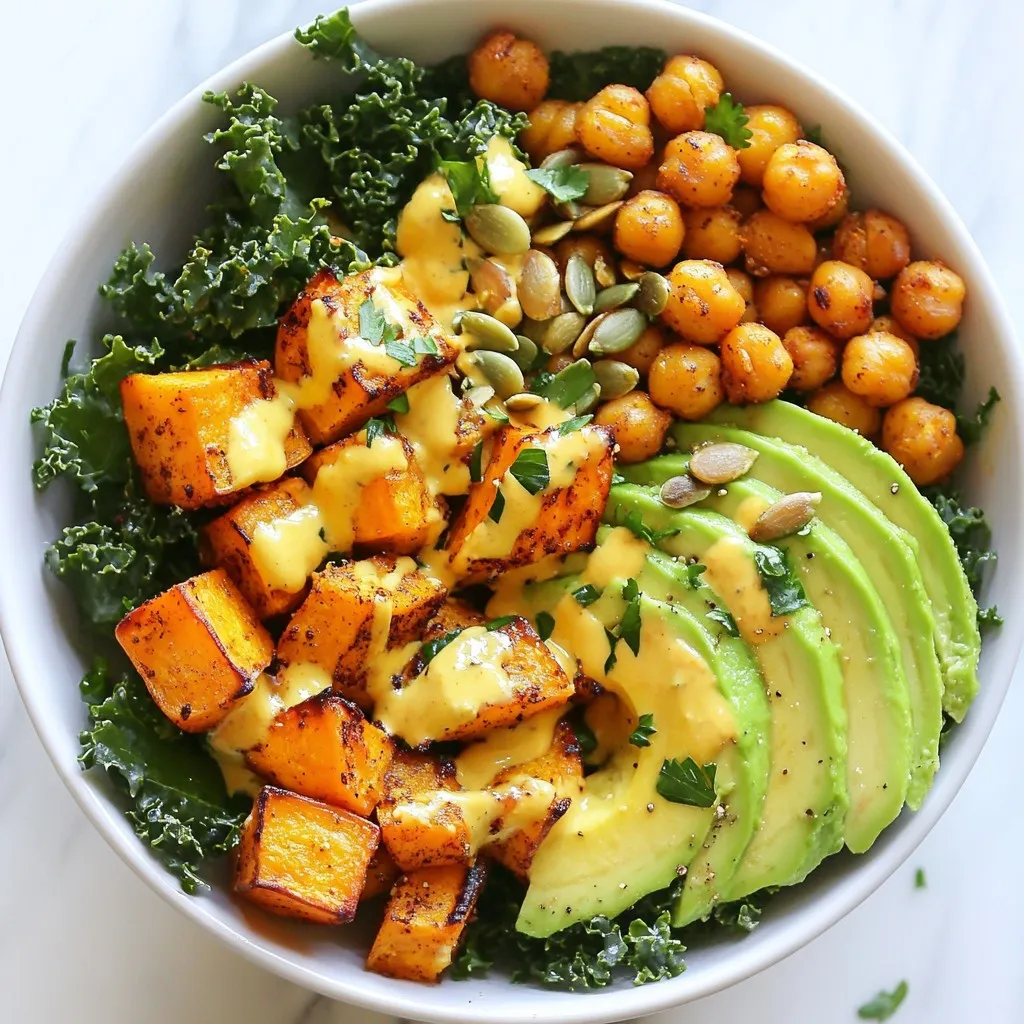 - 2 medium sweet potatoes, peeled and cut into bite-sized cubes - 1 can (15 oz) chickpeas, thoroughly drained and rinsed - 2 tablespoons olive oil - 1 teaspoon smoked paprika - 1 teaspoon ground cumin - Salt and freshly cracked black pepper to taste - 3 cups curly kale, stems removed and chopped - 1 ripe avocado, halved and sliced - 1/4 cup tahini - 2 tablespoons freshly squeezed lemon juice - 1 tablespoon pure maple syrup - 1/4 cup cold water - 1/4 cup pumpkin seeds - Fresh cilantro or parsley leaves {{ingredient_image_2}} - Preheat oven to 425°F (220°C). - Cube and peel the sweet potatoes into bite-sized pieces. - Drain and rinse the chickpeas thoroughly. - Combine sweet potatoes and chickpeas on a baking sheet. - Drizzle with olive oil, then add smoked paprika, ground cumin, salt, and pepper. - Toss to coat everything evenly. - Roast for 25-30 minutes. Toss halfway to ensure even cooking. - In a medium bowl, whisk together tahini, lemon juice, maple syrup, and water. - Adjust the water as needed for your desired sauce thickness. - In the last 5 minutes of roasting, add chopped kale to the baking sheet. - Toss gently with sweet potatoes and chickpeas. - Divide the roasted mix into four bowls. - Add sliced avocado on top of each bowl. - Drizzle with tahini sauce for extra flavor. - Sprinkle with pumpkin seeds and fresh herbs for a finishing touch. To get sweet potatoes and chickpeas just right, I start with high heat. Preheat your oven to 425°F (220°C). This helps them caramelize well. Cut sweet potatoes into small cubes. Small pieces cook faster and become tender. Toss sweet potatoes and chickpeas with olive oil, smoked paprika, cumin, salt, and pepper. This makes sure they are flavorful. Spread them out on the baking sheet. Avoid crowding for better roasting. Toss them halfway through cooking for even color. They should be golden-brown when done. You can add your favorite veggies to these bowls. Try bell peppers, carrots, or broccoli. Each one brings a new flavor and texture. For protein, consider tofu or tempeh. Both options are tasty and fill you up. You can marinate them in your favorite sauce for extra flavor before roasting. Mix and match to suit your taste. This way, your Buddha bowl stays fresh and exciting. Meal prepping makes cooking easier. Roast a big batch of sweet potatoes and chickpeas. Store them in airtight containers. They last up to five days in the fridge. You can also wash and chop your kale ahead of time. Just keep it dry to avoid wilting. When you are ready to eat, reheat everything in the oven or microwave. This keeps the flavors intact. Enjoy your meal without the fuss of daily cooking. Pro Tips Use Fresh Spices: Fresh spices have a more potent flavor, so consider using freshly ground cumin and smoked paprika for a more vibrant taste in your Buddha bowls. Perfectly Cooked Sweet Potatoes: To ensure even cooking, make sure your sweet potato cubes are uniform in size. This will help them roast at the same rate and achieve that golden-brown color. Customize Your Greens: If you don’t have kale, feel free to substitute with spinach or Swiss chard. These greens can also provide a delicious flavor and nutritional boost. Storage Tips: Store any leftover tahini sauce in an airtight container in the fridge. It can last for about a week and can be drizzled on salads or sandwiches for added flavor. {{image_4}} You can easily adapt this recipe for different diets. For a gluten-free meal, all the ingredients listed work well. Chickpeas are naturally gluten-free, so you can use them without worry. If you want to swap out sweet potatoes, try butternut squash or quinoa instead. These options also bring rich flavors. I love to change my Buddha bowls with the seasons. In winter, add brussels sprouts for a hearty touch. Roast them alongside the sweet potatoes for a nice crunch. In summer, try adding zucchini and corn. These veggies add fresh flavors and a pop of color. They keep the dish light and vibrant. To spice things up, add chili flakes or harissa. These will give your bowls a kick. If you prefer a milder dish, try fresh herbs like basil or mint instead. They add a refreshing note. You can also play with spices like coriander or turmeric. Each option brings a new twist to the bowl. To keep your Sweet Potato Chickpea Buddha Bowls fresh, use airtight containers. Glass containers work well and help avoid any strong odors. Let the food cool before sealing to prevent condensation. Store in the fridge for up to four days. You can freeze roasted sweet potatoes and chickpeas. First, cool them completely, then place them in freezer bags. Squeeze out as much air as you can before sealing. For best results, use within three months. To thaw, leave them in the fridge overnight. Reheat in the oven or microwave until hot. In the fridge, the roasted sweet potatoes and chickpeas last about four days. Kale stays good for about two days after cooking. Signs of spoilage include an off smell, slimy texture, or discoloration. Always check your food before eating! To make this recipe vegan, use the same ingredients. Sweet potatoes, chickpeas, and kale are all plant-based. The tahini sauce is also vegan. Just make sure to check your maple syrup for any additives. Enjoy the rich flavors without any animal products. Yes, you can! Other beans work well in this dish. Try black beans, kidney beans, or even lentils. Each will add a unique taste and texture. Just ensure they are cooked and ready to use when you mix them with the sweet potatoes. If you can't find tahini, use almond butter or sunflower seed butter. Both options add creaminess and flavor. You can also blend roasted sesame seeds with olive oil to make a quick tahini substitute. To lower the carbs, reduce the amount of sweet potatoes. Instead, add more leafy greens or cauliflower rice. This keeps the bowl filling and nutritious while cutting down on carbs. Yes, this recipe is great for meal prep! You can roast the sweet potatoes and chickpeas ahead of time. Store them in airtight containers in the fridge. Just add fresh kale and toppings when you’re ready to eat. Each bowl contains healthy ingredients. Typically, you get about 400 calories, with protein from chickpeas and healthy fats from avocado. You also get fiber from sweet potatoes and kale. Always check specific brands for exact nutritional details. This blog post shared a tasty recipe for Sweet Potato Chickpea Buddha Bowls. You learned about key ingredients like sweet potatoes, chickpeas, and kale, plus the tahini sauce that brings it all together. I offered tips for customizing your bowls and storage options for leftovers. Remember, you can mix flavors and veggies based on the season. Get creative with your meals, and enjoy these healthy bowls that fit your needs. Happy cooking!