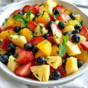 - 2 cups watermelon, cut into 1-inch cubes - 1 cup fresh pineapple, diced into bite-sized pieces - 1 cup strawberries, hulled and halved - 1 cup blueberries, rinsed and drained - 1 large orange, segmented into wedges - Juice of 1 fresh lime - 2 tablespoons pure honey - Fresh mint leaves, roughly chopped When I create a Honey Lime Fruit Salad, I focus on using fresh, vibrant fruits. Each fruit adds its own flavor and color, making the salad a feast for the eyes. You start with juicy watermelon, which brings sweetness and hydration. Pineapple adds a tropical twist, while strawberries give a nice tartness. Blueberries bring small bursts of sweetness, and the orange adds a refreshing citrus note. The honey lime dressing is simple but magical. Fresh lime juice brightens the flavors, and pure honey brings just the right sweetness. It&rsquo;s a perfect match for the fruits. Finally, I like to garnish with fresh mint leaves. They not only look great but also add a fresh aroma. This salad is not just delicious; it is also healthy. You get vitamins, minerals, and antioxidants from all the fruits. Plus, it is easy to make. You can whip it up in just a few minutes. Enjoy this colorful salad at picnics, parties, or as a light dessert. {{ingredient_image_2}} - Start by cutting the watermelon into 1-inch cubes. This size is perfect for a juicy bite. - Next, dice the pineapple into small, bite-sized pieces. Fresh pineapple adds sweetness. - Hull and halve the strawberries. This step makes them easy to eat and enjoy. - Rinse the blueberries gently under cool water to keep them fresh and clean. - Segment the orange into wedges. This adds a nice citrus kick to the salad. - In a small bowl, whisk together the fresh lime juice and pure honey. This mix enhances flavor. - Make sure to whisk until the honey is fully dissolved in the lime juice. A smooth dressing is key. - Drizzle the honey-lime dressing evenly over the prepared fruit. This adds a sweet, tangy taste. - Using a large spoon, gently toss the salad. Be careful not to mash the berries. You want them whole! - Let the salad rest at room temperature for about 10 minutes. This time allows the flavors to blend. - Just before serving, sprinkle freshly chopped mint leaves over the salad. This adds a pop of color. - Serve the salad in individual bowls or a large dish. It looks great and is fun to share! - Choosing ripe watermelon: Look for a watermelon that feels heavy for its size. The skin should be smooth and have a dull spot where it rested on the ground. A yellow spot indicates ripeness. Tap it; a deep sound means it&rsquo;s fresh. - Picking fresh pineapples: When choosing a pineapple, smell the base. It should have a sweet aroma. Check the leaves; they should be green and fresh. The skin should be firm and golden, not soft or shriveled. - Alternative fruits based on season: You can swap fruits based on what&rsquo;s ripe. In summer, add peaches or nectarines. In fall, try apples or pears. This keeps the salad fresh and exciting. - Sweeteners other than honey: If you want a different flavor, use agave syrup or maple syrup. These sweeteners work well and add their unique taste to the dish. - Adding a pinch of salt: A small pinch of salt can make the flavors pop. It balances sweetness and brings out the fruit&rsquo;s natural taste. Just a little goes a long way, so don&rsquo;t use too much. - Using flavored honey: Try infused honey for extra zest. Lavender or citrus honey can add a fun twist. This small change can make your salad unique and delicious. Pro Tips Choose Ripe Fruit: Select fruits that are in season and fully ripe for the best flavor and sweetness in your salad. Chill Before Serving: For a refreshing experience, chill your fruit salad in the refrigerator for about 30 minutes before serving. Customize Your Fruits: Feel free to substitute or add other fruits such as mango, kiwi, or grapes to suit your taste preferences. Mint Preservation: To keep mint fresh longer, add it just before serving to prevent wilting in the fruit salad. {{image_4}} For a fun and bright change, try adding mango or kiwi to your fruit salad. Mango adds a sweet and creamy touch that pairs well with lime. Kiwi brings a tangy taste and a pop of color. Cut the mango into bite-sized pieces. Slice the kiwi into thin rounds or halves. Mix them in with your other fruits for a refreshing twist. You can create a berry medley by incorporating raspberries or blackberries. They add a burst of flavor and color to your salad. Raspberries bring a slight tartness that balances the sweetness. Blackberries add a juicy, rich flavor. Gently fold them into your fruit salad to avoid crushing them. For some crunch, consider adding chopped nuts or seeds. Almonds, walnuts, or sunflower seeds work great. They add texture and healthy fats. Just sprinkle them on top before serving. This will give your salad an extra layer of flavor and a satisfying crunch. To store your Honey Lime Fruit Salad, place it in an airtight container. This keeps the fruit fresh and prevents it from absorbing odors in the fridge. Make sure to cover the container well. You can refrigerate it for up to three days. The dressing may cause the fruit to become soft over time, so enjoy it fresh! The salad lasts about three days in the fridge. After that, the fruit may lose its texture and flavor. If you keep it longer, the taste will not be as good. For the best experience, eat it within the first two days. Always check for any signs of spoilage before eating. I do not recommend freezing the salad. Freezing will change the texture of the fruit. When thawed, the fruit becomes mushy and watery. If you want to prepare fruit ahead of time, freeze the individual fruits separately. Then, mix them with the dressing when you're ready to serve. Yes, you can prepare this salad ahead of time. To keep it fresh, store the fruit and dressing separately. Mix them together just before serving. This keeps the fruit from getting soggy. Aim to prepare it no more than a few hours in advance for the best taste. If you want to try other dressings, consider these options: - Citrus vinaigrette: Combine orange juice, olive oil, and a bit of honey. - Yogurt dressing: Mix plain yogurt with lime juice and a touch of honey. - Mint dressing: Blend fresh mint leaves with lime juice and a little sugar. These dressings can add unique flavors to your fruit salad. This salad works well for meal prep. Keep the fruit in one container and the dressing in another. You can pack them in individual servings. This way, you can enjoy a healthy snack or side dish all week long. Just remember to mix them right before you eat! You can use canned fruit, but there are pros and cons. Advantages: - Canned fruit is convenient and often cheaper. - It has a longer shelf life than fresh fruit. Disadvantages: - Canned fruit may contain added sugars. - It often lacks the fresh taste and texture of fresh fruit. When choosing canned fruit, look for options without added sugar for a healthier choice. This blog post covers how to make a fresh fruit salad with a honey lime dressing. We explored selecting ripe fruits, preparing the ingredients, making the dressing, and combining everything. We also shared tips for variations and proper storage. To sum up, this salad is easy to prepare and refreshing. It's a perfect dish for any occasion. Enjoy experimenting with different fruits and flavors to find your ideal mix. Get creative and make it your own!